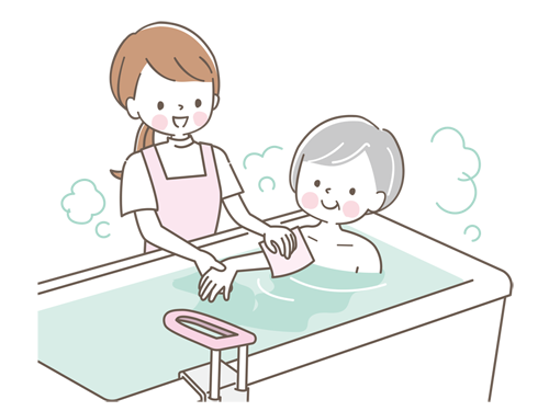 高齢女性の入浴介助をする介護職員